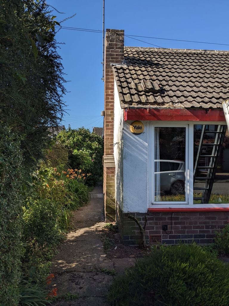 Roof work on sunny day.