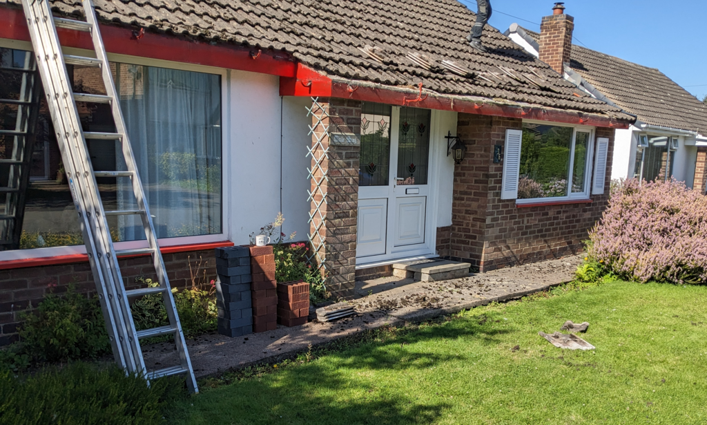 Roof and guttering work, front of bungalow.